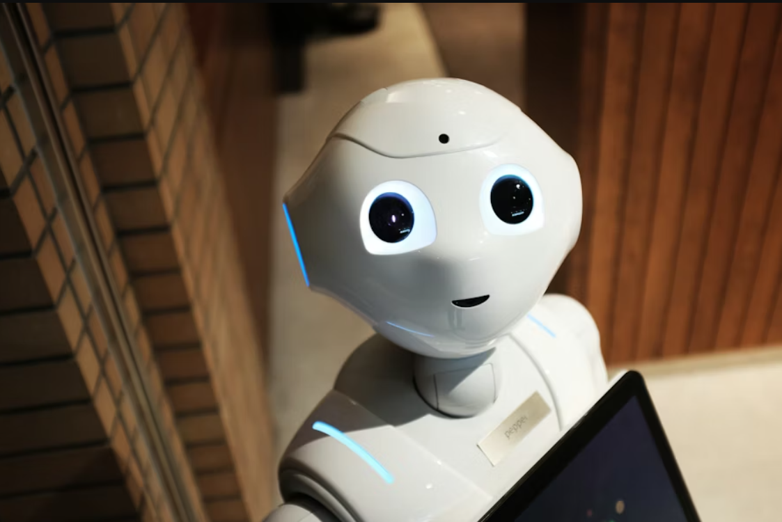 Professional using AI software on multiple screens